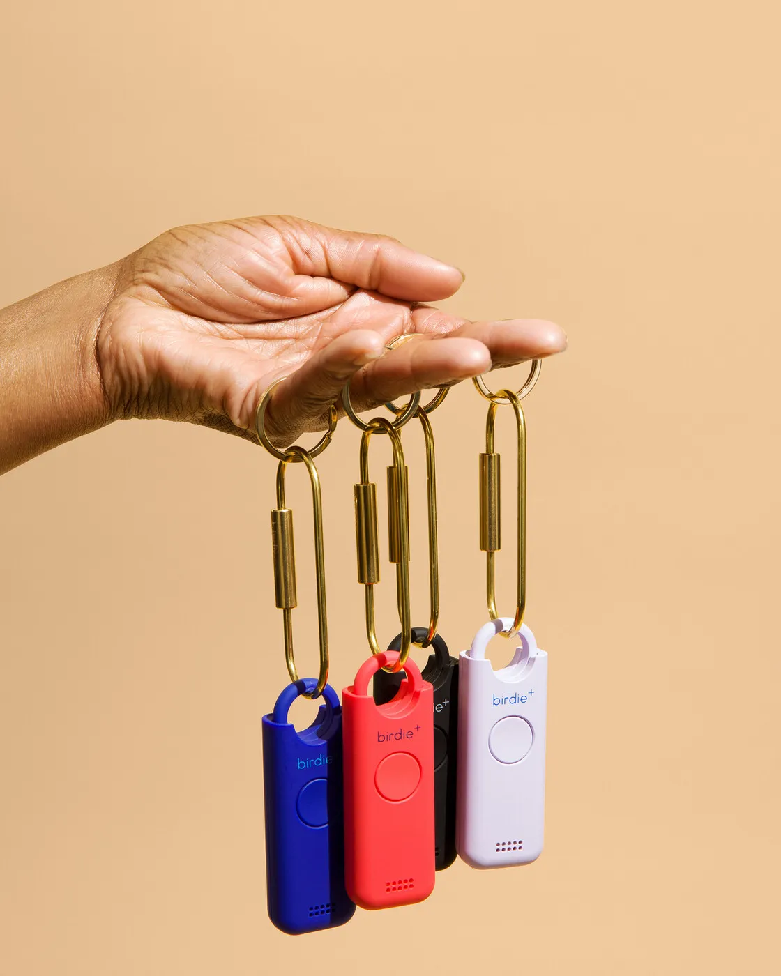 hand holding keychains